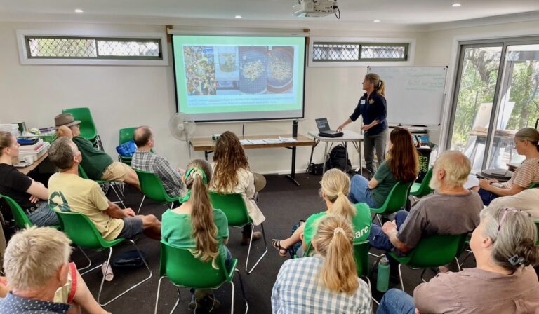 People watching a seed collection lecture